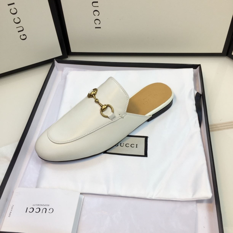 G*u*i slippers